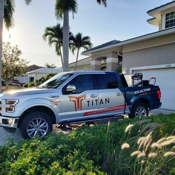 Titan Truck parked in front of a garage